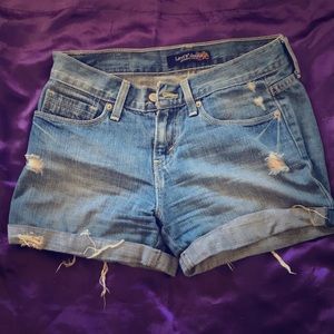 Ripped Levi’s blue jean shorts size 1